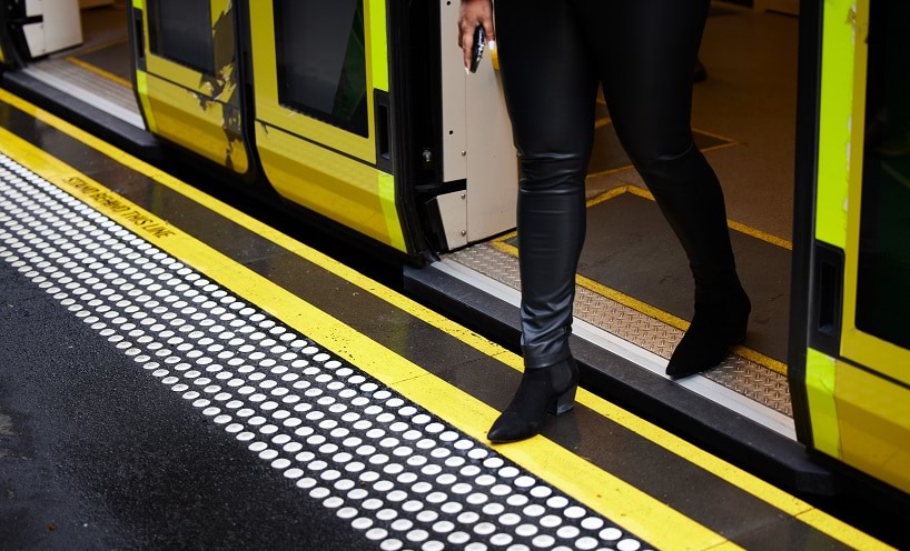 Person stepping of a Tram