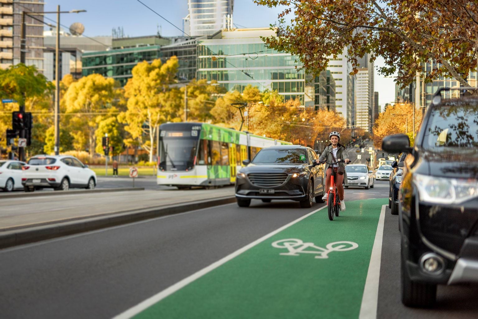 Photo of a cyclist riding on a bike lane in Melbourne CBD